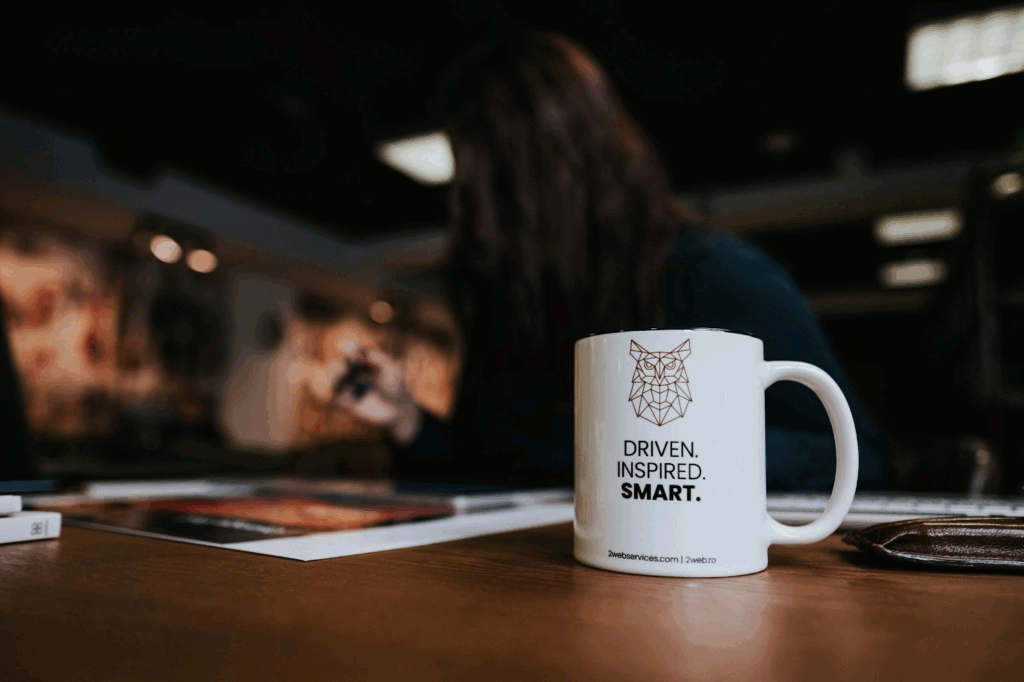 Coffee mug with motivational text.